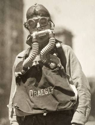 WWI: GAS MASK, 1918. American soldier showing a type of gas mask. Photograph, 1918.  Copyright: xGRANGERx xGRANGERx 0646177
