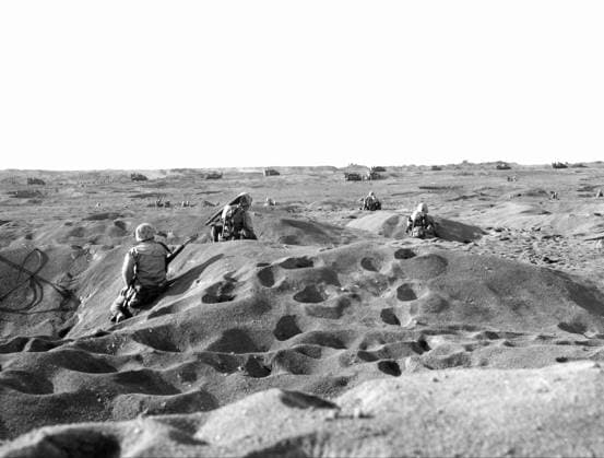 WWII: IWO JIMA, 1945. United States marines of Fourth Division advancing over volcanic sand during the Battle of Iwo Jima. Photograph by Karl Thayer Soule, 1945.  Copyright: xGRANGERx xGRANGERx 0651447