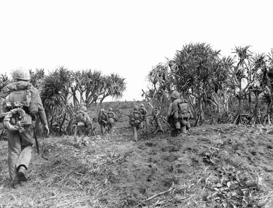 WWII: IWO JIMA, 1945. United States marines of the 3rd Division advancing across Iwo Jima during the American invasion of the island. Photograph by Karl Thayer Soule, 1945.  Copyright: xGRANGERx xGRANGERx 0651536