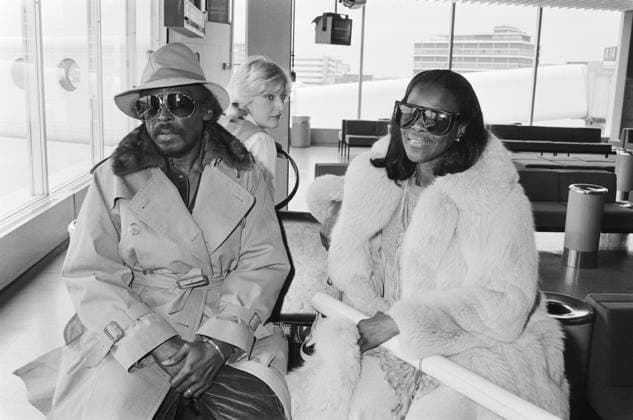 MILES DAVIS (1926-1991). American jazz musician, with his wife, actress Cecily Tyson at Schiphol airport in Amsterdam, the Netherlands. Photograph by Marcel Antonisse, 27 April 1982.  Copyright: xGRANGERx xGRANGERx 0908437