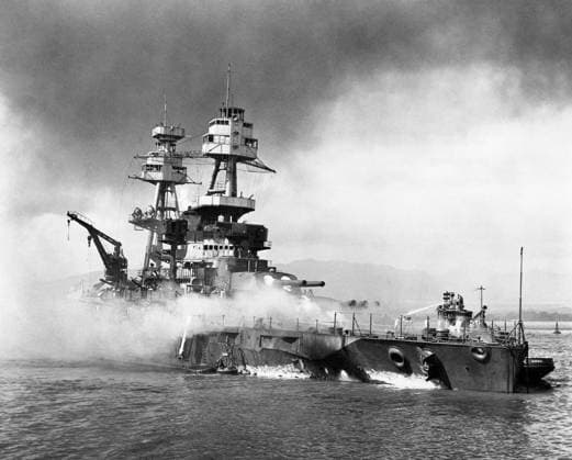 USS NEVADA, 1941. The USS Nevada (BB-36) battleship beached and burning after being hit forward by Japanese bombs and torpedoes on 7 December 1941 during the attack on Pearl Harbor, Hawaii.  Copyright: xGRANGERx xGRANGERx 0908825