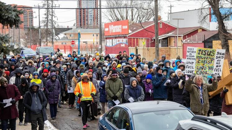March 29, 2024, Edmonton, Canada: A crowd of devotees participates in The Way of the Cross procession through downtown Edmonton. Edmonton Canada - ZUMAs197 20240329_aaa_s197_240 Copyright: xRonxPalmerx