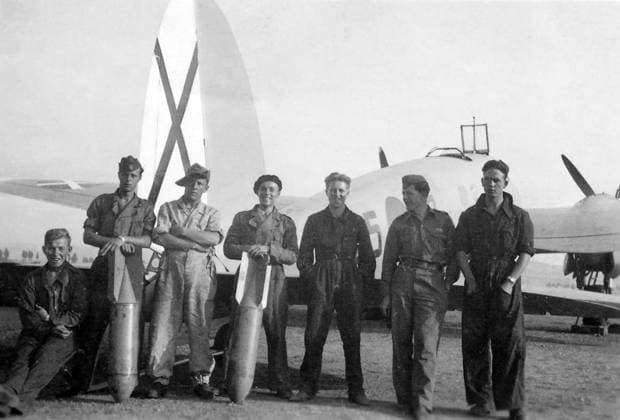 Spain: Ground crew and pilots of the Condor Legion posing in front of a Heinkel He-111 B during the Spanish Civil War, c. 1937 The Condor Legion (German: Legion Condor) was a unit composed of volunteers from the German Air Force (Luftwaffe) and from the German Army (Wehrmacht Heer) which served with the Nationalists during the Spanish Civil War of July 1936 to March 1939.<br ><br > The Condor Legion developed methods of terror bombing which were used widely in the Second World War shortly afterwards. The bombing of Guernica was the most infamous operation carried out by the Condor Legion. Hugo Sperrle commanded the unit s aircraft formations and Wilhelm Ritter von Thoma commanded the ground element. Copyright: xxPicturesxFromxHistoryx