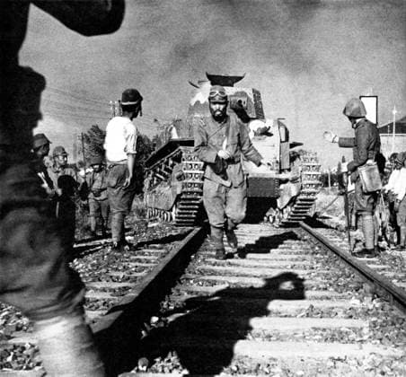 China: Imperial Japanese troops guiding a tank across the Shanghai-Nanking (Nanjing) railway line, 1937 The Second Sino-Japanese War (July 7, 1937 September 9, 1945) was a military conflict fought primarily between the Republic of China and the Empire of Japan. After the Japanese attack on Pearl Harbor, the war merged into the greater conflict of World War II as a major front of what is broadly known as the Pacific War.<br ><br > Although the two countries had fought intermittently since 1931, total war started in earnest in 1937 and ended only with the surrender of Japan in 1945. The war was the result of a decades-long Japanese imperialist policy aiming to dominate China politically and militarily and to secure its vast raw material Copyright: xxPicturesxFromxHistoryx
