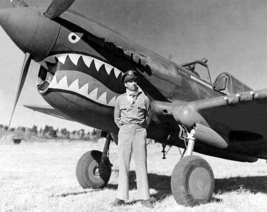 China: Flying Tiger pilot and brigadier general in the United States Air Force Robert Lee Scott Jr. (1908-2006), standing beside his Curtiss P-40 Warhawk, Kunming, 1943 Flying Tigers was the popular name of the 1st American Volunteer Group (AVG) of the Chinese Air Force in 1941-1942. The pilots were United States Army (USAAF), Navy (USN), and Marine Corps (USMC) personnel, recruited under Presidential sanction and commanded by Claire Lee Chennault; the ground crew and headquarters staff were likewise mostly recruited from the U.S. military, along with some civilians.<br ><br > The group consisted of three fighter squadrons with about 20 aircraft each. It trained in Burma before the American entry into World War II with the mission of def Copyright: xxPicturesxFromxHistoryx