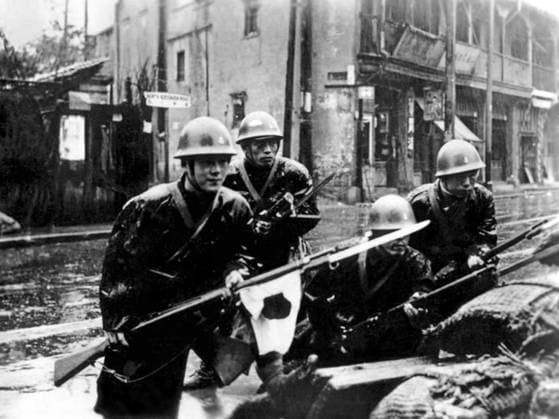 China Japan: Japanese Special Naval Landing Forces troops engage in street fighting during the Battle of Shanghai in heavy rain, August 1937 The Second Sino-Japanese War (July 7, 1937 September 9, 1945) was a military conflict fought primarily between the Republic of China and the Empire of Japan. After the Japanese attack on Pearl Harbor, the war merged into the greater conflict of World War II as a major front of what is broadly known as the Pacific War.<br ><br > Although the two countries had fought intermittently since 1931, total war started in earnest in 1937 and ended only with the surrender of Japan in 1945. The war was the result of a decades-long Japanese imperialist policy aiming to dominate China politically and militari Copyright: xxPicturesxFromxHistoryx