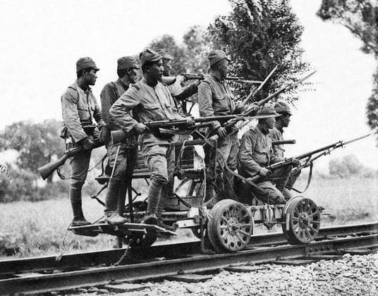 China Japan: Japanese Imperial Army soldiers with Arisaka Type 38 rifles on a railway hand cart, China, 1937. Asahigraph, September 1937 The Second Sino-Japanese War (July 7, 1937 September 9, 1945) was a military conflict fought primarily between the Republic of China and the Empire of Japan. After the Japanese attack on Pearl Harbor, the war merged into the greater conflict of World War II as a major front of what is broadly known as the Pacific War.<br ><br > Although the two countries had fought intermittently since 1931, total war started in earnest in 1937 and ended only with the surrender of Japan in 1945. The war was the result of a decades-long Japanese imperialist policy aiming to dominate China politically and militarily a Copyright: xxPicturesxFromxHistoryx