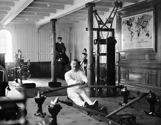 UK: RMS Titanic, The Gym, c. 1912 RMS Titanic was a British passenger liner that sank in the North Atlantic Ocean in the early morning of 15 April 1912, after colliding with an iceberg during her maiden voyage from Southampton to New York City.<br ><br > Of the 2,224 passengers and crew aboard, more than 1,500 died in the sinking, making it one of the deadliest commercial peacetime maritime disasters in modern history. The largest ship afloat at the time it entered service, the RMS Titanic was the second of three Olympic class ocean liners operated by the White Star Line, and was built by the Harland and Wolff shipyard in Belfast. Copyright: xxPicturesxFromxHistoryx