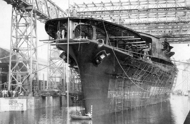Japan: Imperial Japanese Navy aircraft carrier Akagi after its launch at the Kure naval shipyard, 6 April 1925 Akagi was an aircraft carrier built for the Imperial Japanese Navy (IJN), named after Mount Akagi in present-day Gunma Prefecture. Though she was laid down as an Amagi-class battlecruiser, Akagi was converted to an aircraft carrier while still under construction to comply with the terms of the Washington Naval Treaty. The ship was rebuilt from 1935 to 1938 with her original three flight decks consolidated into a single enlarged flight deck and an island superstructure.<br ><br > Akagi s aircraft served in the Second Sino-Japanese War in the late 1930s. Upon the formation of the First Air Fleet or Kido Butai (Striking Force) in ear Copyright: xxPicturesxFromxHistoryx