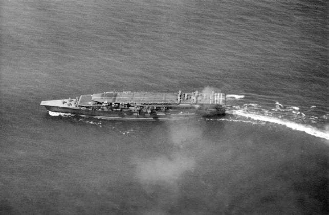 Japan: Imperial Japanese Navy aircraft carrier Kaga conducting operations in 1930. On the upper deck are Mitsubishi B1M torpedo bombers, Nakajima A1N Type 3 fighters are parked on the lower deck forward Kaga was an aircraft carrier built for the Imperial Japanese Navy (IJN) and was named after the former Kaga Province in present-day Ishikawa Prefecture. Originally intended to be one of two Tosa-class battleships, Kaga was converted under the terms of the Washington Naval Treaty to an aircraft carrier as the replacement for the battlecruiser Amagi, which had been damaged during the 1923 Great Kanto earthquake. Kaga was rebuilt in 1933 35, increasing her top speed, improving her exhaust systems, and adapting her flight decks to more modern, Copyright: xxPicturesxFromxHistoryx