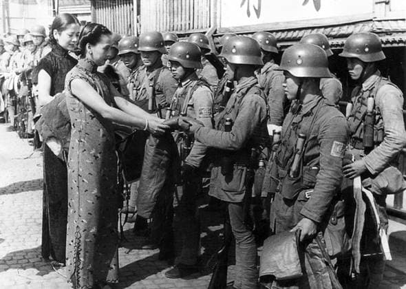 China: Women give thanks to Chinese Nationalist soldiers who held out for days against the besieging Imperial Japanese Army after evacuation of the Chapei, Battle of Shanghai, 1937 The Second Sino-Japanese War (July 7, 1937 September 9, 1945) was a military conflict fought primarily between the Republic of China and the Empire of Japan. After the Japanese attack on Pearl Harbor, the war merged into the greater conflict of World War II as a major front of what is broadly known as the Pacific War.<br ><br > Although the two countries had fought intermittently since 1931, total war started in earnest in 1937 and ended only with the surrender of Japan in 1945. The war was the result of a decades-long Japanese imperialist policy aiming to d Copyright: xxPicturesxFromxHistoryx