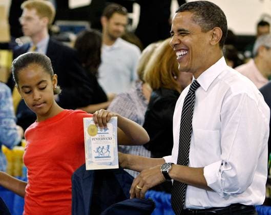Obama6408.JPG.Washington, DC - June 25, 2009 -- United States President Barack Obama (R) and his daughter Malia (L) help volunteers and members of Congress stuff backpacks with books, food and photographs of the first dog Bo during a United We Serve event at Fort McNair June 25, 2009 in Washington, DC. Helping to fill 10,000 backpacks for children of military servicemen and women, the first family stuffed copies of The Lightning Thief, by Rick Riordan, and The Penderwicks, by Jeanne Birdsall into backpacks along with food items and a personal letter from the president and the first lady. .Photo by Chip Somodevilla POOL-CNP-PHOTOlink. Washington DC USA EDITORIAL USE ONLY Copyright: xx ChipxSomodevilla POOL-CNP-PHOTOlink.netx phlphotos244687