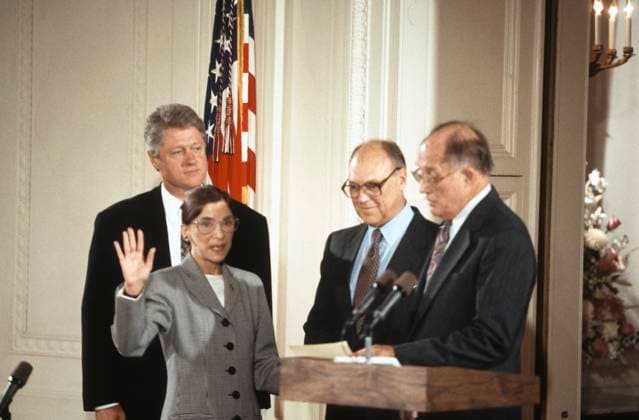 Ruth Bader Ginsburg is Sworn-in as Associate Justice of the United States Supreme Court Associate Justice of the Supreme Court Ruth Bader Ginsburg, left center, is sworn-in by Chief Justice of the United States William H. Rehnquist, right, during a ceremony in the East Room of the White House in Washington, DC on August 10, 1993. US President Bill Clinton, left, and Martin Ginsburg, right center, look on. Justice Ginsburg replaces Associate Justice Byron R. White. Credit: Arnie Sachs CNP Washington District of Columbia United States of America EDITORIAL USE ONLY Copyright: xx 63705-24 ArniexSachsx cnpphotos174077