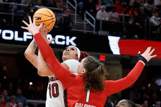 SPORTS-BKW-NCSTATE-SCAROLINA-2-CS South Carolina s Kamilla Cardoso (10) shoots as North Carolina State s River Baldwin (1) defends during the Final Four of the NCAA Tournament at Mortgage FieldHouse on Friday, April 5, 2024, in Cleveland. (Tracy Glantz The State TNS) EDITORIAL USE ONLY Copyright: xx 107681130W TracyxGlantzx krtphotoslive940528