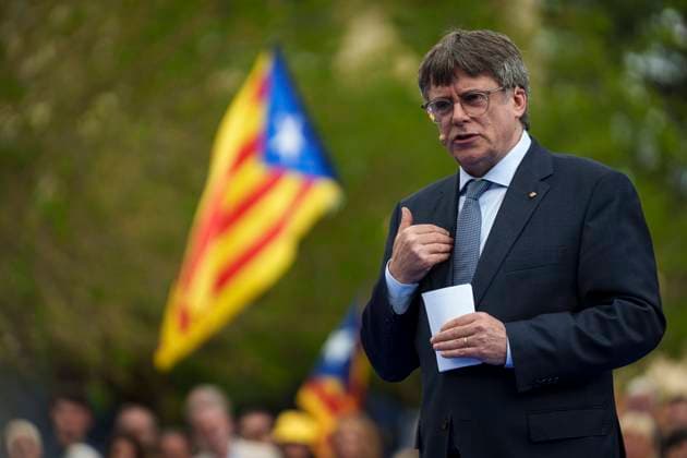 Former Catalan regional President Carles Puigdemont (C), pro-independent JxCat party s leader, attends a party s event to announce that he will run in next Catalan regional election, called on next 12 May, in the town of Elna, southern France, 06 April 2024. A deal struck with Junts Per Cat (JPC) (Together for Catalunya, in Catalonian) allowed Spain s Prime Minister Pedro Sanchez (PSOE) to form a new minority coalition government following an inconclusive election last July. Junts is a group set on achieving independence for the northeastern region of Catalonia and is headed by Carles Puigdemont, who fled Spain after leading an illegal secession bid in 2017, and he will able to come back the country when the so-called Amnesty Law will be pa  Copyright: xDavidxBorratx GRAF3976 20240406-55013283241_1