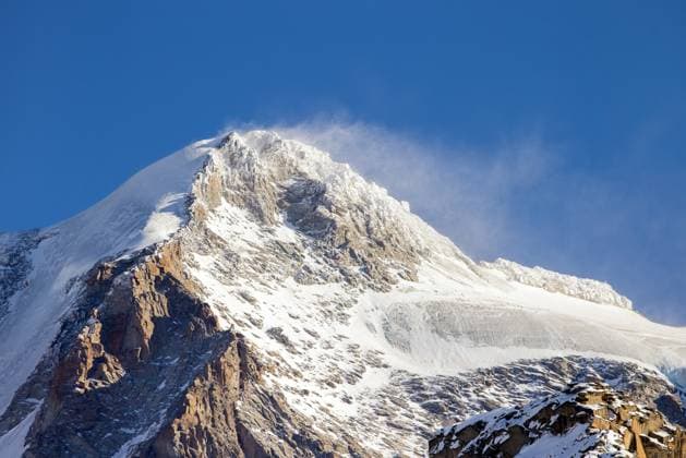 Gran Paradiso, Grand Paradis on a windy day in winter, mountain top in the Graian Alps between the Aosta Valley and Piedmont in Italy *** Gran Paradiso, Grand Paradis ON a Windy Day in winter, Mountain Top in The Graian Alps between The Aosta Valley and Piedmont in Italy Copyright: imageBROKER alimdix xArterrax xS ibltsm10429283.jpg RECORD DATE NOT STATED