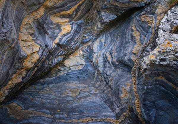 Creative Highlights World Rock formation in shades of blue and orange with a lot of texture and folded overlapping layers. Rock formation in shades of blue and orange with a lot of texture and folded overlapping layers. Copyright: xZoonar.com CarlosxSanchezxBenayasx 21139106