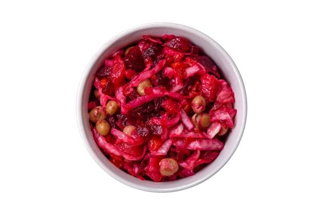 Delicious juicy vinigret salad of boiled vegetables potatoes, beets, pot, cabbage and carrots Delicious juicy vinigret salad of boiled vegetables potatoes, beets, pot, cabbage and carrots with salt and spices on a dark concrete background Copyright: xZoonar.com TetianaxChernykovax 21142015