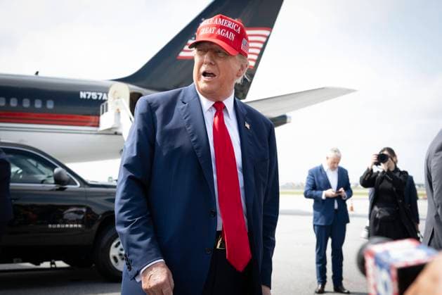 April 10, 2024, Atlanta, Georgia, USA: Wearing his signature red baseball cap with slogan Make America Great Again former American President DONALD J. TRUMP, 77, greets crowd as he arrives at on his private jet at Atlanta Hartsfield-Jackson Airport. Trump is scheduled to attend a major fundraising event for his current campaign in Atlanta later today. Atlanta USA - ZUMAn03_ 20240410_zaf_n03_012 Copyright: xRobinxRaynex