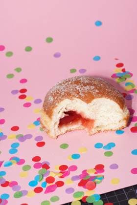 Traditional German Carnival Sweets Berliner, Pfannkuchen or Krapfen in front of a colourful background Traditional German Carnival Sweets Berliner, Pfannkuchen or Krapfen in front of a colourful background Copyright: xZoonar.com KSTOCKx 21291921