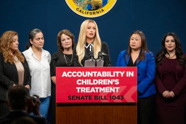 April 15, 2024, Sacramento, California, USA: Celebrity and youth advocate and survivor PARIS HILTON speaks during a bipartisan press conference to highlight Senate Bill 1043, also known as the Accountability in Children s Treatment Act (ACT) on Monday, April 15, 2024 in Sacramento. The bill is a children s protection measure that will create more accountability at youth treatment facilities. Also seen from left to right are Senator ANGELIQUE ASHBY (D-Sacramento), Senator AISHA WAHAB (D-Hayward), Senator SHANNON GROVE (R-Bakersfield), Senator JANET NGUYEN (R-Huntington Beach) and Senator SUSAN RUBIO. (D-Los Angeles County). Sacramento USA - ZUMAj89_ 20240415_zaf_j89_004 Copyright: xPaulxKitagakixJr.x