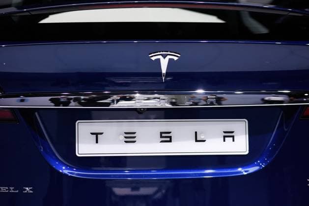 Tesla Will Lay Off More Than 10% Of Global Workforce File photo - Tesla Model X on display on the first press day of Paris Motor Show 2016, known as Mondial de l Automobile in Paris, France on September 29, 2016. Tesla will lay off more than 10% of its global workforce, according to a memo sent to employees by CEO Elon Musk. The company?s shares closed down more than 5% on Monday. Tesla had 140,473 employees as of December 2023. Tesla shares have taken a bruising in recent months, falling 31% year to date. While electric vehicle sales are still gaining popularity worldwide, their sales growth rate has slowed especially for Tesla. The company now faces more competition than ever. Photo by Eliot Blondet ABACAPRESS.COM Paris France  Copyright: xBlondetxEliot ABACAx