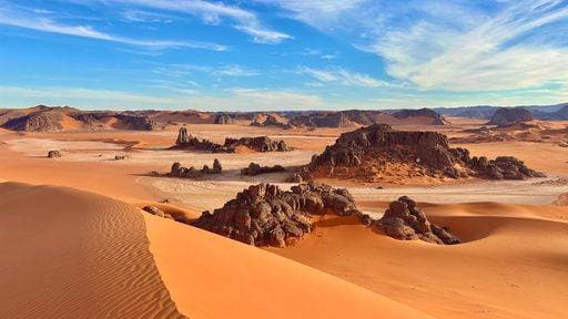 Creative Highlights World A scenic view of sandy dunes in a sunny desert 24124634 RECORD DATE NOT STATED