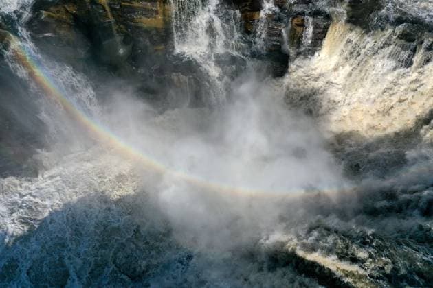 Creative Highlights World LINFEN, CHINA - APRIL 18: Rainbow arches over the Hukou Waterfall on the Yellow River on April 18, 2024 in Linfen, Shanxi Province of China.  Copyright: xVCGx 111491642794