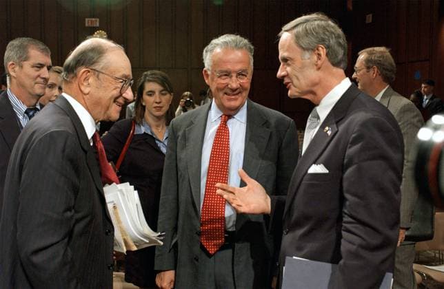 GREEENSPAN TESTIFIES ON MONETARY POLICY Washington, DC - July 16, 2002 -- Alan Greenspan, Chairman, Board of Governors, Federal Reserve System, left, chats with Chairman Paul Sarbanes (Democrat of Maryland), center, and US Senator Tom Carper (Democrat of Delaware) following the U.S. Senate Banking, Housing, Urban Affairs Committee in Washington on 16 July, 2002. The hearing focused on the Federal Reserve Board s monetary policy report. Credit: Ron Sachs CNP Washington District of Columbia United States of America EDITORIAL USE ONLY Copyright: xx RonxSachsx-xCNPx cnpphotos195632