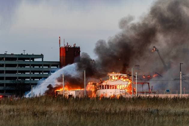 April 22, 2024, Edmonton, Alberta, Canada: 3 elevated water canons are used by Edmonton Fire in a 5 alarm fire which destroyed a historic WWII air hangar in Edmonton. The Hangar which was built in 1942 was declared a historical building of significance for its part in the shipment of Equipment, Troops and aircraft for the US Forces on route to Russia. The cause of the fire is currently under investigation and no word yet regarding estimated damages. Edmonton Canada - ZUMAs197 20240422_aaa_s197_301 Copyright: xRonxPalmerx