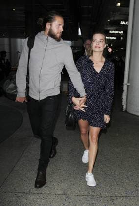 Margot Robbie wears a cute polka dot shirt dress as she arrives at LAX Airport with her new husband Tom Ackerley 160539, Margot Robbie wears a cute polka dot shirt dress as she arrives at LAX Airport with her new husband Tom Ackerley. The 26 year old Australian star secretly married British-born assistant film director Ackerley in December in a ceremony in Australia. Los Angeles, California - Monday January 2, 2017.,  Copyright: xPacificCoastNewsx xAvalonx 0532823686