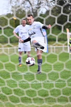 Macron Takes Part In Charity Football Match - Plaisir President Emmanuel Macron (R) scores a penalty kick during the Varietes Club charity football match to benefit children in hospital, in Bernard Giroux stadium, in Plaisir, outside Paris, France on April 24, 2024. Photo by Eric Tschaen Pool ABACAPRESS.COM Plaisir IDF France  Copyright: xTschaenxEric Pool ABACAx