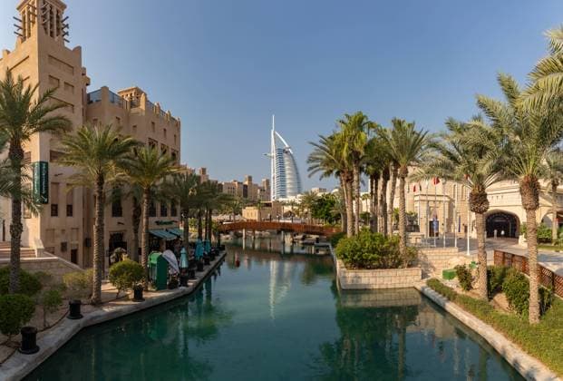 Burj Al Arab Hotel and Souk Madinat Jumeirah A picture of the Souk Madinat Jumeirah and the Burj Al Arab Hotel in the far center. Copyright: xZoonar.com BrunoxCoelhox 21508829