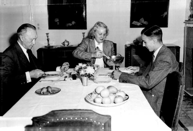 Pretty blonde Elisabeth Adenauer, who has run the house since her mother died two years ago, helps herself to some soup. Konrad Adenauer (left) and his son Georg continue with their meal. September 01, 1949.  Copyright: xCopyrightxUnknownx 5513-35479951