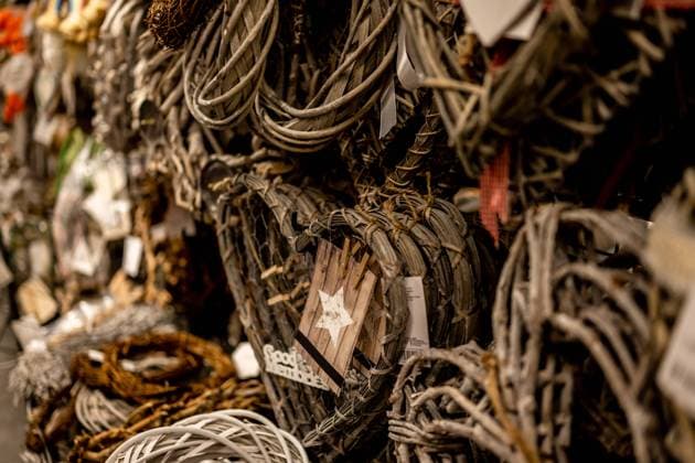 Wooden wreath variety at outdoors market Wooden handmade wreath variety for door decoration at outdoors market. Festive seasonal craft design idea for home Copyright: x RECORD DATE NOT STATED
