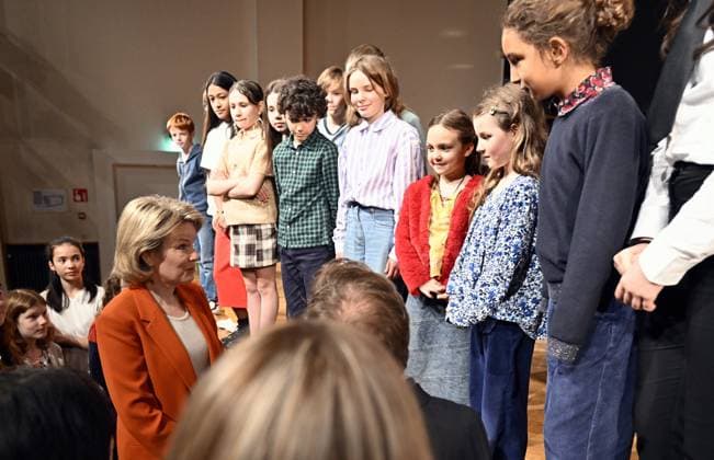 Queen Mathilde of Belgium and Students pose for the photographer during a visit to the music academy in Anderlecht, Brussels on Friday 03 May 2024.  ERICxLALMAND 91998952