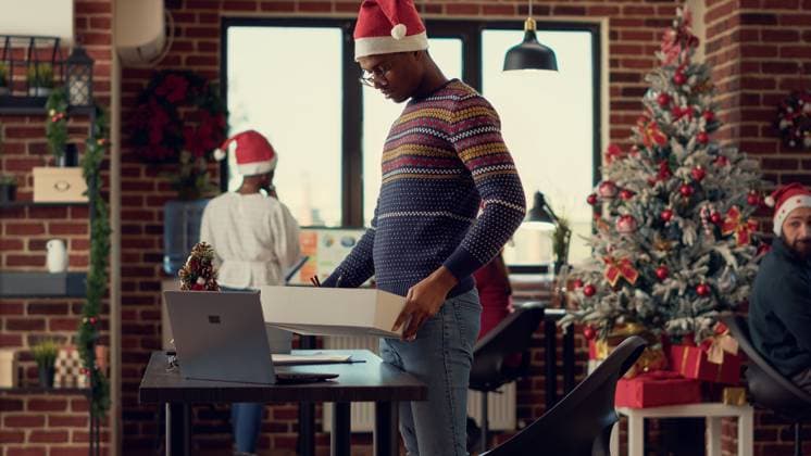 African american person getting fired and losing job African american person getting fired and losing job during winter holiday season, feeling depressed and frustrated about unemployment. Being unhappy about career failure in festive office. Copyright: x RECORD DATE NOT STATED