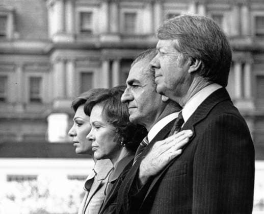 Carters Host the Shah and Shahbanu of Iran for a State Visit United States President Jimmy Carter, right, and first lady Rosalynn Carter, second left, during the State Arrival ceremonies for Mohammad Reza Pahlavi, the Shah of Iran, second right, and Farah Diba Pahlavi, the Shahbanu of Iran, left, in the Grand Foyer of the White House in Washington, DC on November 15, 1977. The Shah and Shahbanu were visiting Washington for a State Visit. Their visit was met by demonstrators fighting in the streets in front of the White House injuring more than a hundred people. Credit: Benjamin E. Gene Forte CNP Washington District of Columbia United States of America EDITORIAL USE ONLY Copyright: xx WA-4818 856-30 BenjaminxE.x Gene xFortex-xCNPx cnpphotos216357