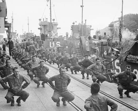RECORD DATE NOT STATED D-Day - Limbering up for the Invasion American soldiers use the dockside in a small English harbour to keep fit during the pre-landing period. The landing ships are berthed alongside. D-Day began on June 6th, 1944 at 6:30am and was conducted in two assault phases  Copyright: Copyrightx(c)Geminix2023.xCredit:xGemini 10282393