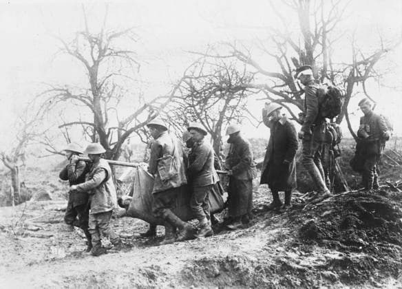 RECORD DATE NOT STATED British prisoners WWI British prisoners carrying a wounded comrade from the battlefield near Origny during the Battle of St Quentin in France during World War I Date: March 1918  Copyright: Copyrightx(c)Geminix2023.xCredit:xGemini 10297732