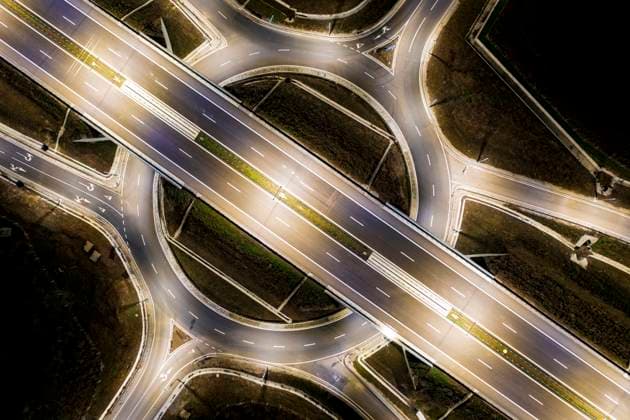 Aerial view of urban highway intersection road in the night light. Copyright: x RECORD DATE NOT STATED
