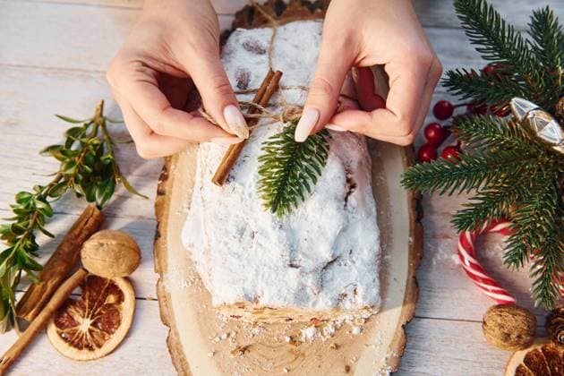 Stollen with holiday decorations. Christmas background Stollen with holiday decorations. Christmas background. Copyright: x RECORD DATE NOT STATED