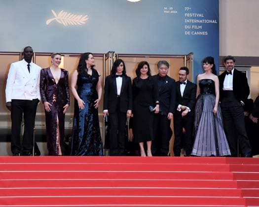 Cannes, 77th Cannes Film Festival 2024, Red carpet Opening Ceremony and film Le Deuxieme Acte In the photo: Omar Sy, Greta Gerwig, Lily Gladstone, Nadine Labaki, Hirokazu Kore-eda, Ebru Ceylan, Juan Antonio Bayona, Eva Green, Pierfrancesco Favino  Copyright: xAlbertoxTerenghix xipa-agency.nex xPoolxPhotoxEventsx03x IPA_Agency_IPA46059943
