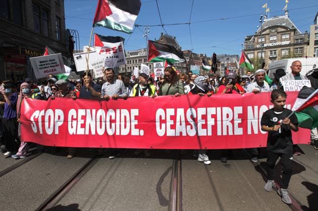 People take part during march protest to commemorate the 76th anniversary of the Nakba and against the ongoing conflict Israel and the Palestinian at the Dam Square on May 11, 2024 in Amsterdam,Netherlands. Nakba Day marks the anniversary of the some 700,000 Palestinians fled or were expelled on Israel s founding in 1948. Amsterdam Netherlands Copyright: xPauloxAmorimx xVWPicsx amp20240511_008
