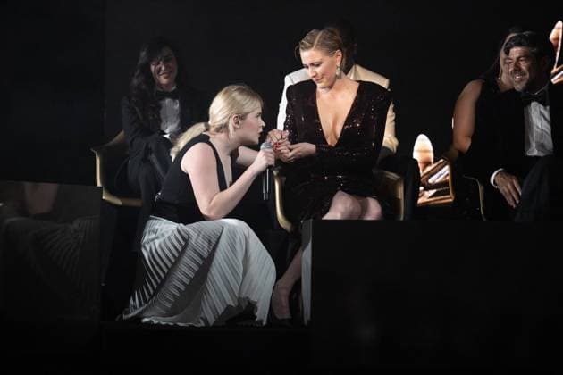 Annual Cannes Film Festival - Opening Ceremony - Cannes President of the Jury Greta Gerwig is seen on stage while Zaho de Sagazan (L) is performing on stage during the opening ceremony at the 77th annual Cannes Film Festival at Palais des Festivals on May 14, 2024 in Cannes, France. Photo by David NIVIERE ABACAPRESS.COM CANNES France  Copyright: xNivierexDavid ABACAPRESS.COMx
