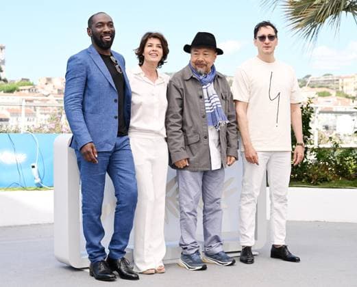 French actors Gregoire Colin, Cyril Guei, actress Irene Jacob and Cambodian director Rithy Pahn attend the photo call for Meeting With Pol Pot at the 77th Cannes Film Festival in Cannes, France on Friday, May 17, 2024.  CAN20240517140 RUNExHELLESTAD