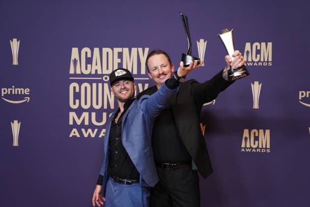 May 16, 2024, Frisco, Texas, United States: (L-R) Greylan James and Chase McGill, winners of the Song of the Year Award for Next Thing You Know pose with their prize in the press room during the 59th Academy of Country Music Awards Ceremony at The Ford Center at the Star. Frisco United States - ZUMAe321 20240516_zea_e321_014 Copyright: xJavierxVicenciox xEyepixxGroupx