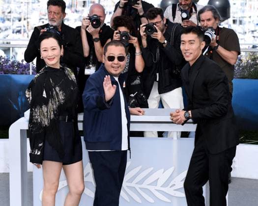 77th Cannes Film Festival 2024 Photocall film Caught By The Tides Cannes, 77th Cannes Film Festival 2024 Photocall film Caught By The Tides In the photo: Jia Zhangke, Zhao Tao, Zhou You Cannes France  Copyright: xIPA ABACAx