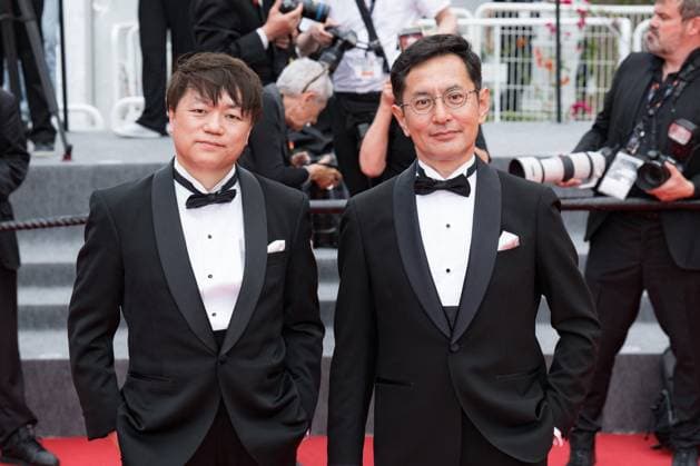 Cannes Palme D Or Winner Studio Ghibli Red Carpet NG Goro Miyazaki and Kenichi Yoda attending the ?Palme D Or Winner Studio Ghibli? Screening and Red Carpet at Palais Des Festivals in Cannes, France on May 20 2024 as part of the 77th Cannes Film Festival. Photo by Nicolas Genin ABACAPRESS.COM Cannes France  Copyright: xGeninxNicolas ABACAx