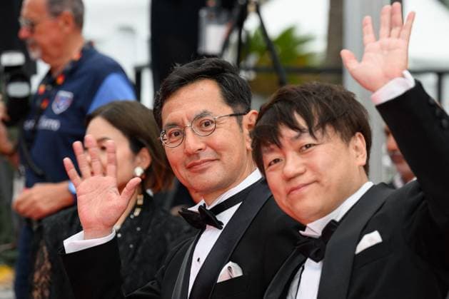 Cannes Palme D Or Winner Studio Ghibli Red Carpet NG Goro Miyazaki and Kenichi Yoda attending the ?Palme D Or Winner Studio Ghibli? Screening and Red Carpet at Palais Des Festivals in Cannes, France on May 20 2024 as part of the 77th Cannes Film Festival. Photo by Nicolas Genin ABACAPRESS.COM Cannes France  Copyright: xGeninxNicolas ABACAx